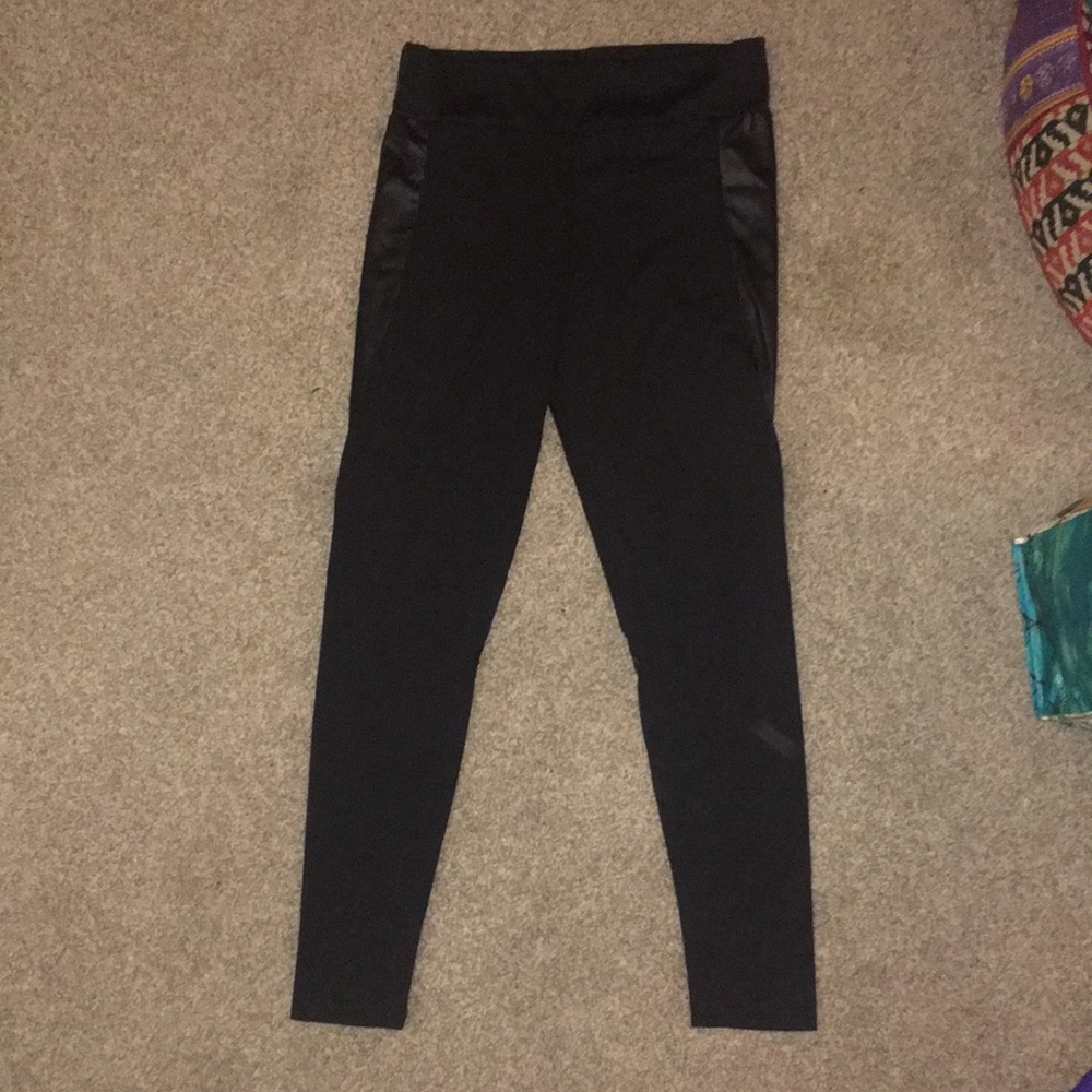 Black leggings with faux leather booty trim